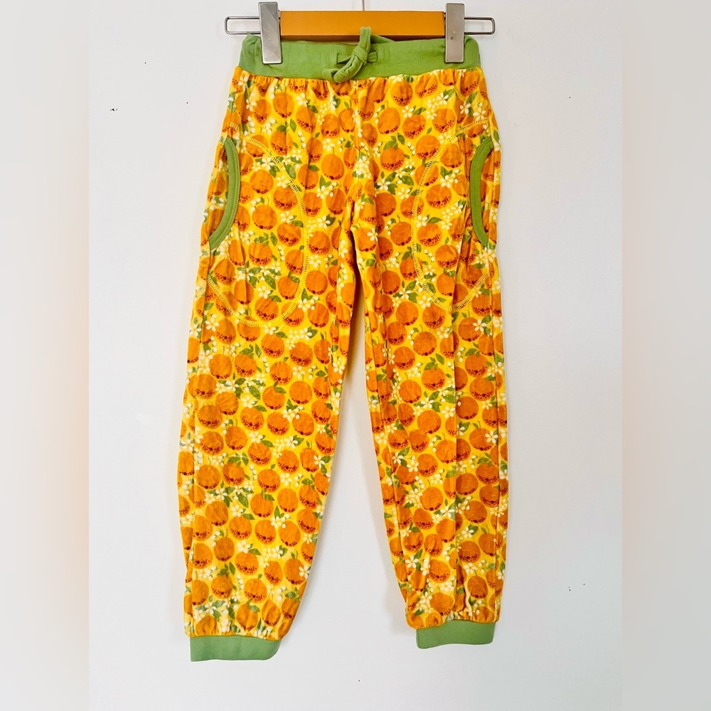 DUNS velvety Orange Print Jogger Pants. 100% organic cotton. Neutral gender